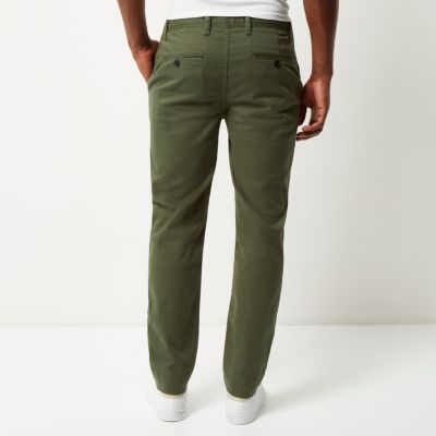 Green tapered chino trousers